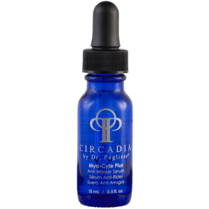 A bottle of mercadia anti - aging serum on a white background.